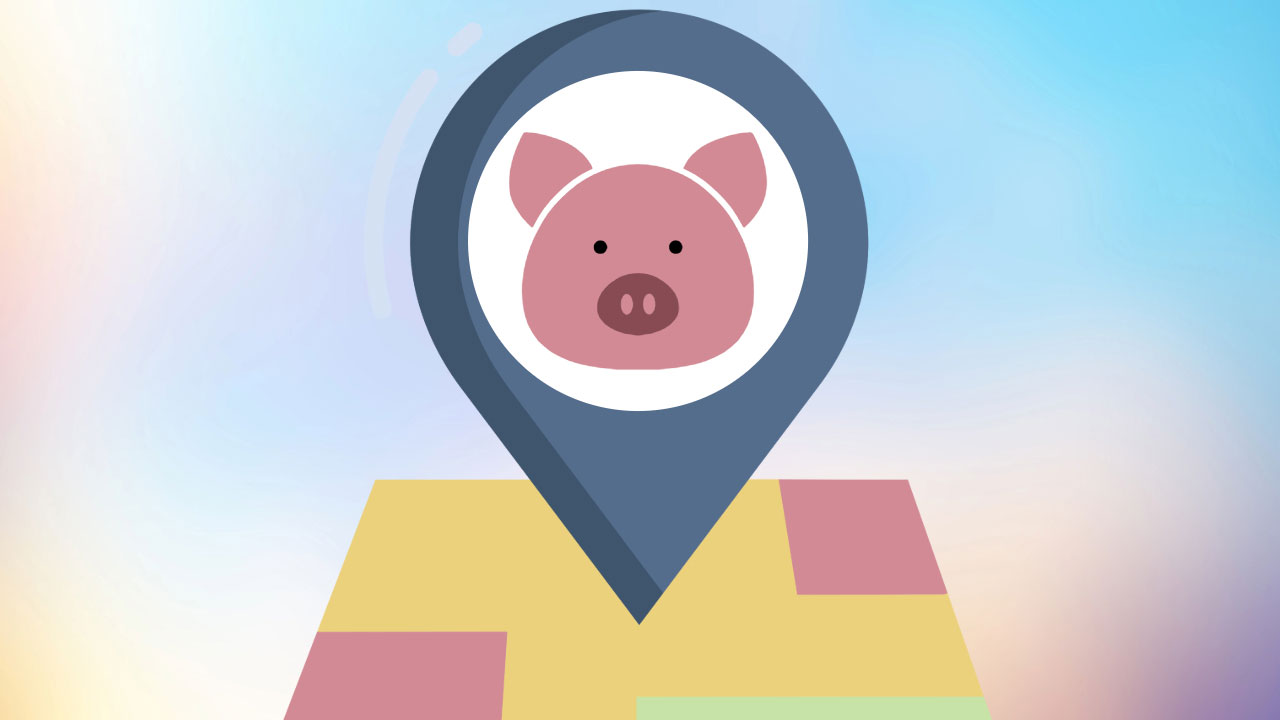 The image depicts a stylized map pin or location marker icon. The icon features a cute, simplified pig or piglet face in pink with a snout and dots for eyes inside a white circle. The circle is surrounded by a navy blue teardrop-shaped outline, which is the typical shape used for map pins or locator icons. The pin or marker is placed on a yellow geometric shape resembling a map or geographic area, with pink accents or borders around it, suggesting it is mapping or locating something related to pigs or pig farms on a map interface.